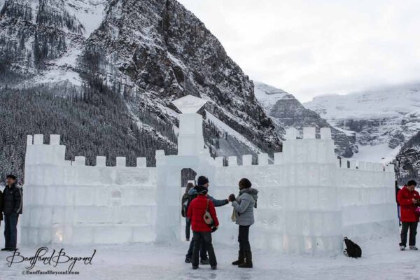 carved-ice-castle-lake-louise-skating-rink-outdoor-mountains-winter-tourist-activity