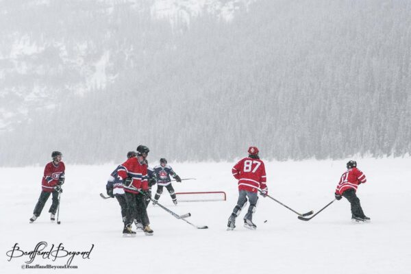 hockey playing on frozen lake louise