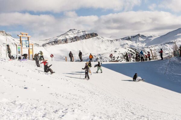 skiers at top of lake louise ski resort