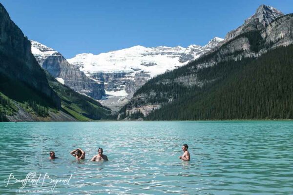 polar-bear-dip-lake-louise-canada-day-celebrations-festive-touristt-attraction-national-holiday-turquoise-glacier-water-rocky-mountains
