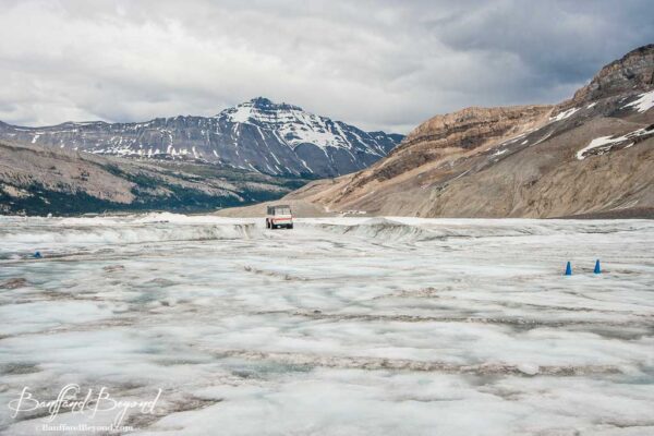 ice explorer traveling across the athabasca glacier at columbia icefields