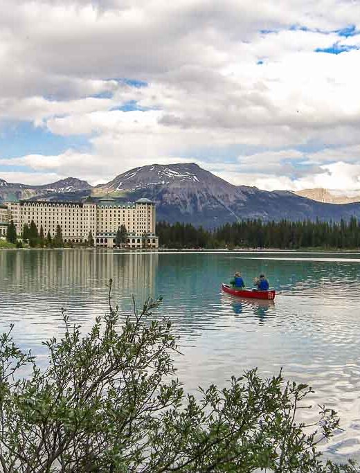 canoe-rental-lake-louise-october-quiet-tranquil-water-mountain-scenery-views-boat-popular-tourist-attraction-highlight-rockies