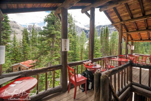 view of mountains from patio at plain of six glaciers tea house in lake louise