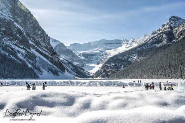 skating-frozen-lake-louise-winter-activity-banff-national-park-tourist-attraction