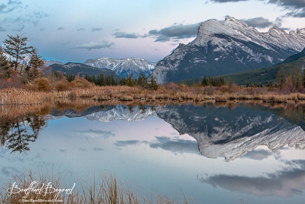 reflection of mount rundle in the waters of vermillion lake in banff